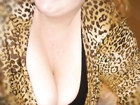 Young curvy wife shows her DDD titts.