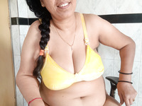 Meena in yellow bra smile